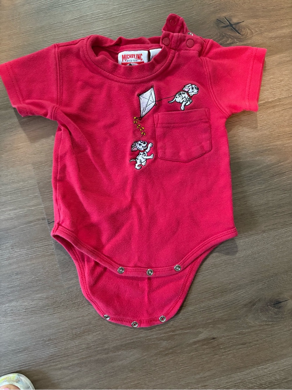 Mickey Inc. Red Baby Onesie with Dalmatians & Kite